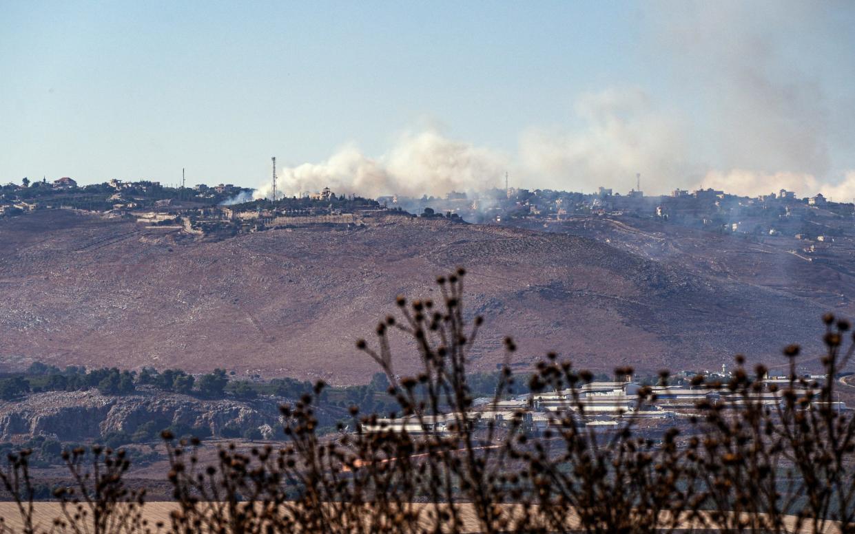 Smoke rises above Lebanon following an Israeli strike near the border