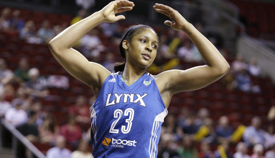 Minnesota Lynx's Maya Moore in action against the Seattle Storm in the first half of a WNBA basketball game, Sept. 10, 2013, in Seattle. Moore has officially decided to retire from playing basketball, making her announcement on “Good Morning America” on Monday, Jan. 16, 2023. (AP Photo/Elaine Thompson)