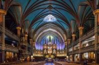 <p>Montreal's Notre-Dame is best known for its breathtaking, vibrant interiors and is a jewel of Quebec's religious history. The Gothic Revival structure was built in the 1820s and features dual towers reminiscent of Paris's eponymous cathedral. </p><p>Notre-Dame's striking interior design can be attributed to local artist, Jean-Baptiste Lagacé, who was supervised by architect Victor Bourgeau. Alongside being a place of Catholic worship, prayer, and teaching, the cathedral houses state funerals, celebrity weddings, and year-round musical performances featuring a 7,000-pipe Casavant organ.<br></p>