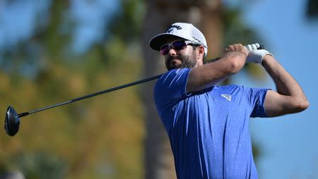 Jan 19, 2019; La Quinta, CA, USA; Adam Hadwin plays his shot from the 18th tee during the third round of the Desert Classic golf tournament at PGA West - Nicklaus Private Course. Mandatory Credit: Orlando Ramirez-USA TODAY Sports