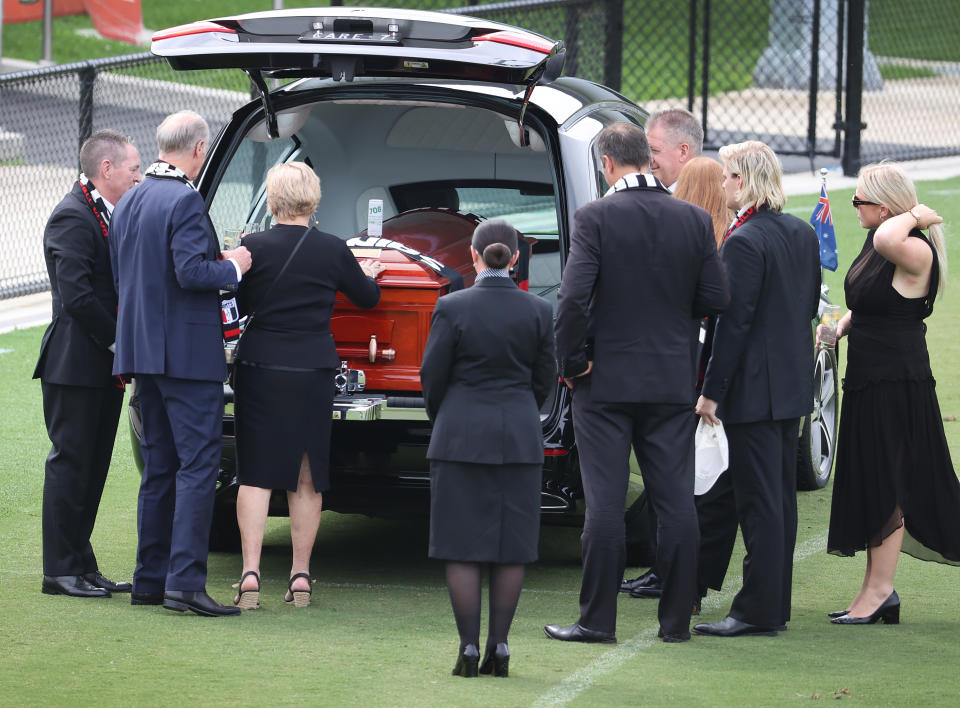 Shane Warne's mother, pictured here bidding a final farewell at his funeral.