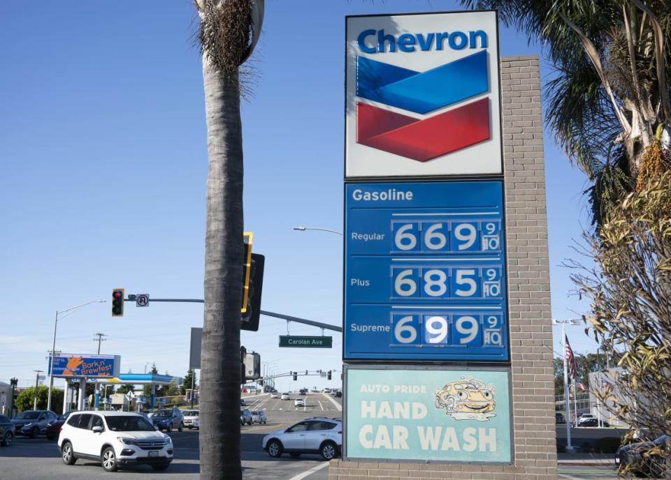 <div class="inline-image__caption"><p>Gasoline prices are displayed at a gas station on June 11 in San Mateo County, California.</p></div> <div class="inline-image__credit">Liu Guanguan/China News Service via Getty</div>