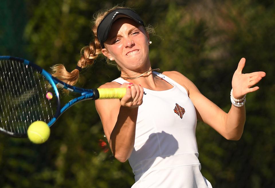 New Hanover's Sophia Catino takes on Hoggard’s Hailey Schreiber as New Hanover played Hoggard at New Hanover High School in girls tennis Tuesday Oct. 9, 2023 in Wilmington, N.C.. KEN BLEVINS/STARNEWS