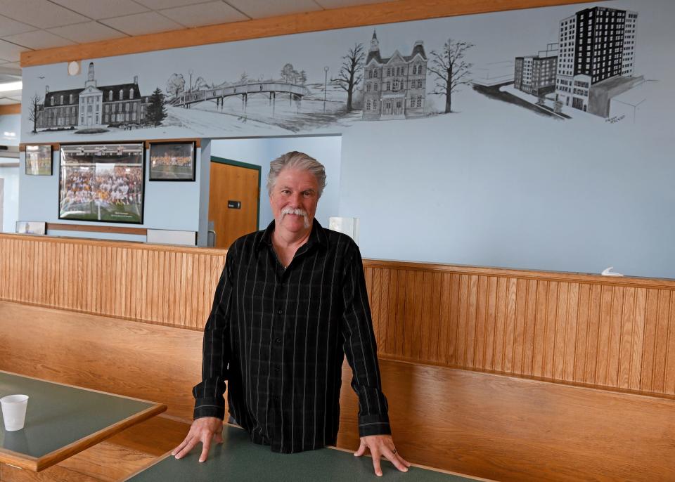 Denny Mcleod's latest mural is at the Bagel Bakery Cafe depicting Holloway Hall at Salisbury University, the City Park Bridge, the courthouse and The Ross in Salisbury, Maryland.