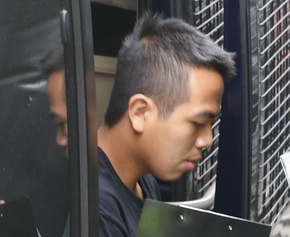 林朗彥因反新界東北示威被判囚13個月，其後成功保釋，圖為他步出囚車進入法院。圖片來源：Getty Images