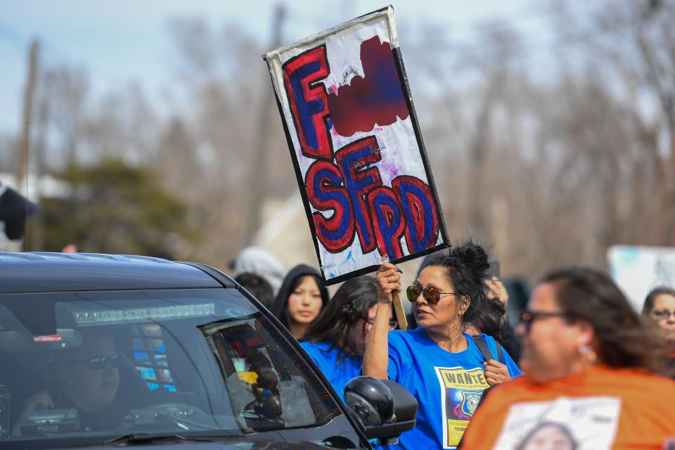 A demonstrator carries a "F--- SFPD" sign during the "March for Justice" Friday, April 5, 2024, in Sioux Falls. Editor's note: The obscenity has been intentionally blurred to comply with Gannett's policy.