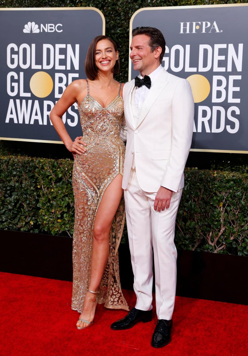 Happy couple: Bradley Cooper and his girlfriend Irina Shayk at the Golden Globes (Reuters)