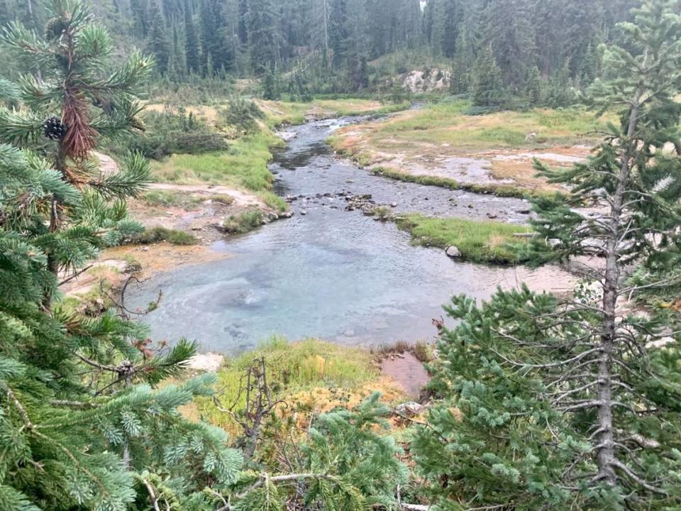 An influx of cold water from the connecting creek make it possible to enjoy a soak in Mr. Bubbles hot spring, which is located in Yellowstone National Park’s backcountry.