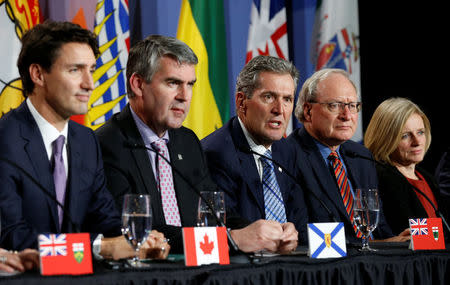 Manitoba Premier Brian Pallister (C) speaks during the closing news conference at the First Ministers’ meeting in Ottawa, Ontario, Canada, December 9, 2016. Also pictured are Canada's Prime Minister Justin Trudeau (L), Nova Scotia Premier Stephen McNeil (2nd L), Prince Edward Island Premier Wade MacLauchlan (2nd R) and Alberta Premier Rachel Notley. REUTERS/Chris Wattie