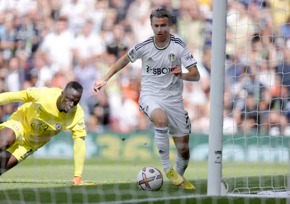 Brenden Aaronson of Leeds United beats Edouard Mendy of Chelsea to score their side's first goal of the game during the Premier League match between Leeds United and Chelsea FC at Elland Road.