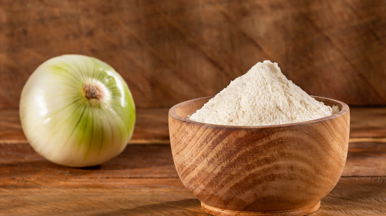 Onion with bowl and powder