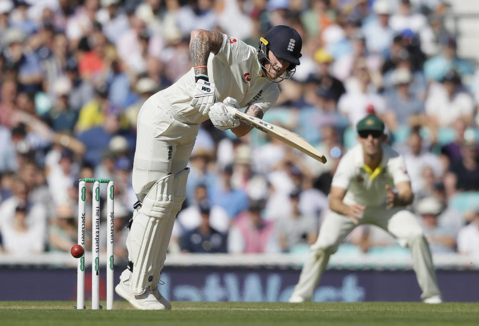 England's Ben Stokes plays a shot off the bowling of Australia's Josh Hazlewood during the third day of the fifth Ashes test match between England and Australia at the Oval cricket ground in London, Saturday, Sept. 14, 2019. (AP Photo/Kirsty Wigglesworth)