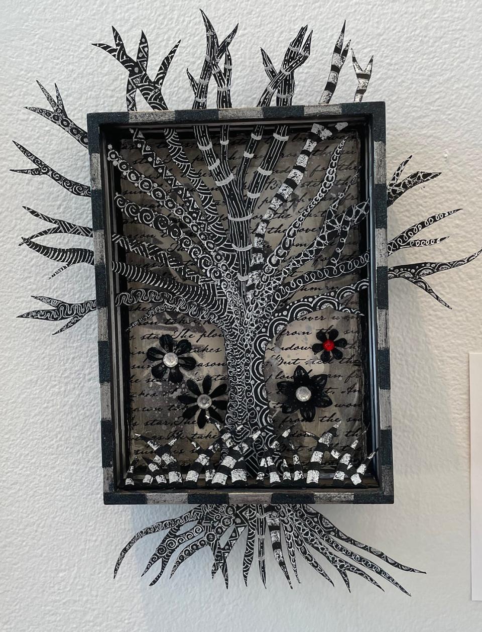 Lara Williams "Tangled Tree Magic," a mixed media diorama of a tree that was based on a book she loved reading, "The Night Circus."