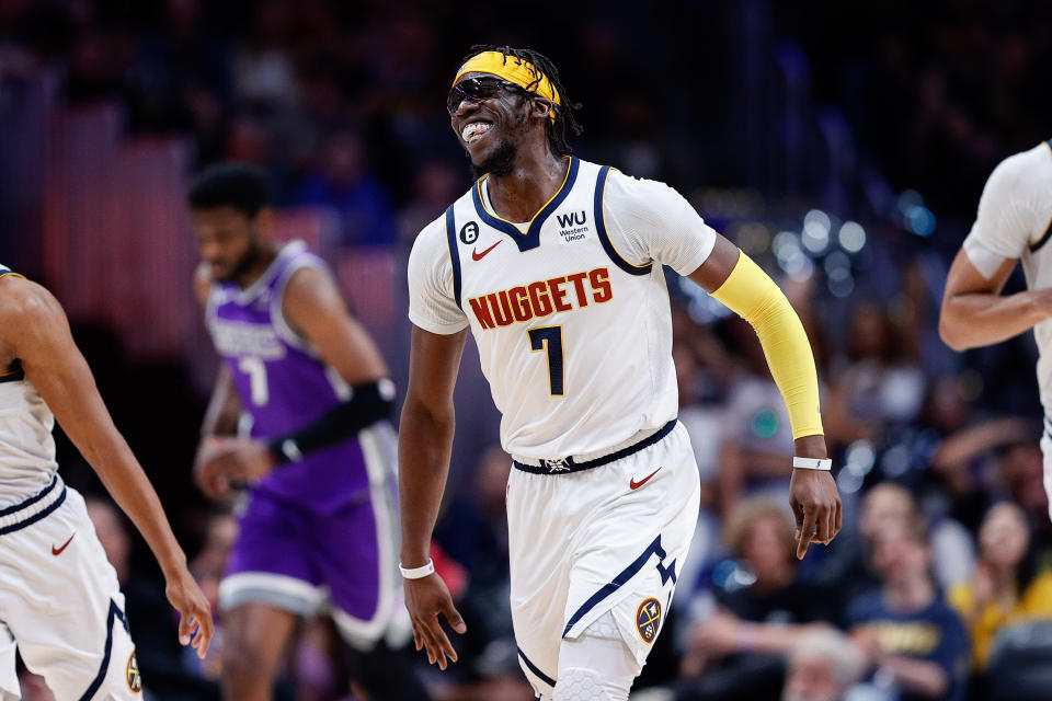 Penjaga Denver Nuggets Reggie Jackson tersenyum setelah bermain dalam pertandingan bulan April di Ball Arena.  (Yesaya J. Downing/USA TODAY Sports)