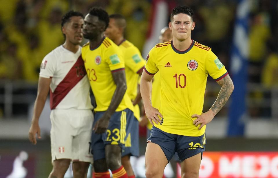 Colombia's James Rodriguez, reacts at the end of the game against Peru during a qualifying soccer match for the FIFA World Cup Qatar 2022 at Roberto Melendez stadium in Barranquilla, Colombia, Friday, Jan. 28, 2022. Peru won 1-0.(AP Photo/Fernando Vergara)