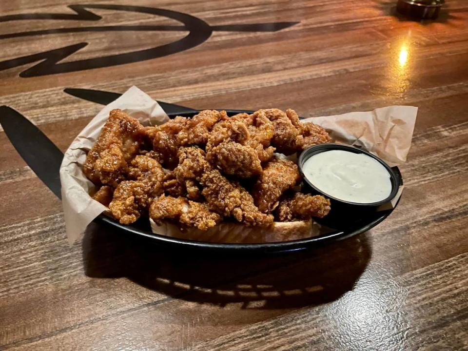 “Bawk bites” are Bawk’s dark meat nuggets coated in a customer’s choice of sauce, such as maple hot.