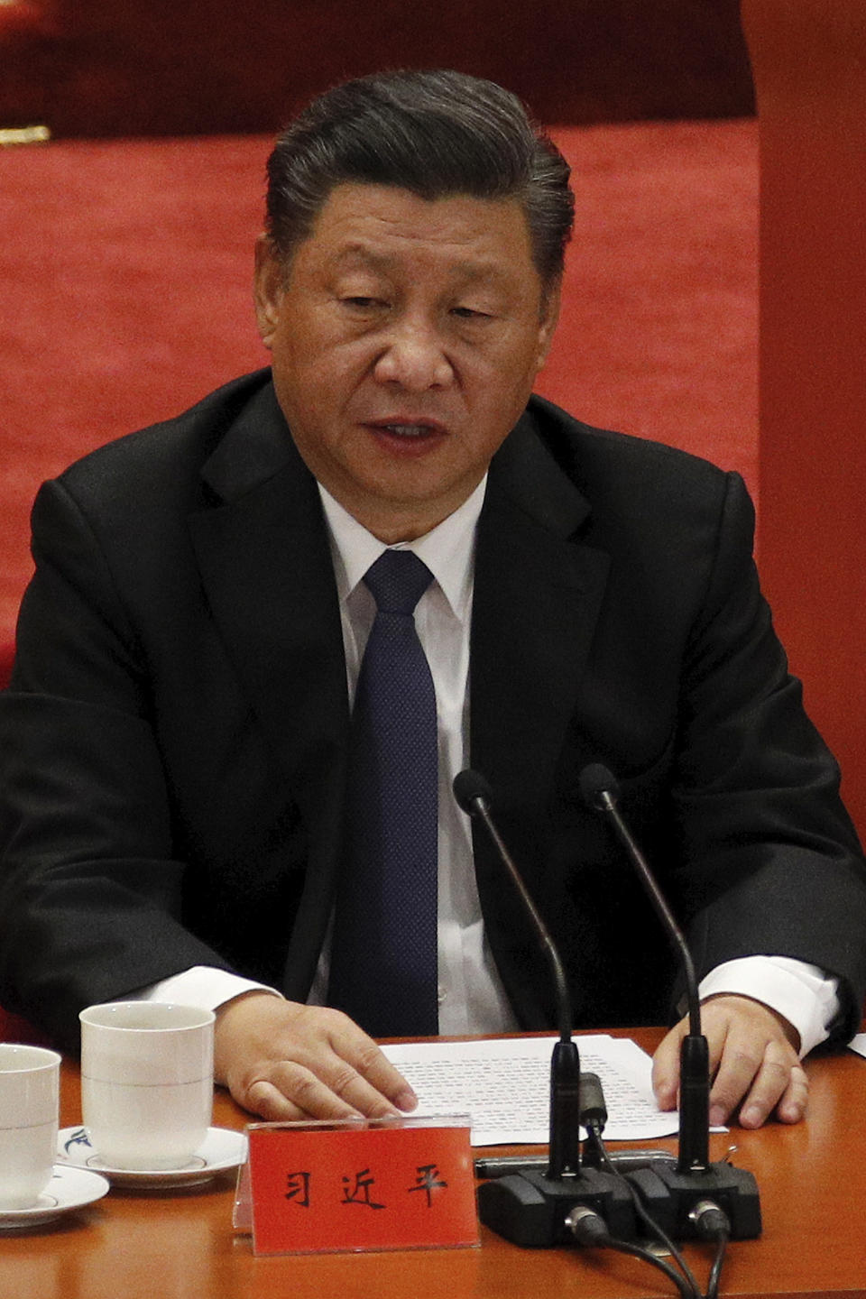 Chinese President Xi Jinping delivers his speech at the commemorating conference on the 70th anniversary of the Chinese army entering North Korea to resist the U.S. army, at the Great Hall fo the People in Beijing, Friday, Oct. 23, 2020. (AP Photo/Andy Wong)