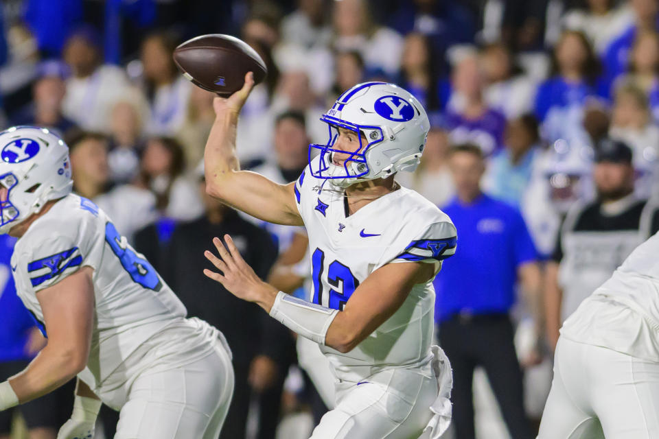 BYU quarterback Jake Retzlaff (12) passes the football during an NCAA college football game against Kansas State, Saturday, Sept. 21, 2024, in Provo, Utah. (AP Photo/Tyler Tate)