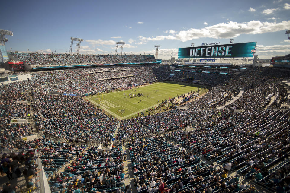 FILE - In this Dec. 16, 2018, file photo, fans watch during the first half of an NFL football game between the Jacksonville Jaguars and the Washington Redskins in Jacksonville, Fla. The Jaguars, along with Cincinnati, Miami, Tampa Bay and maybe a few others, might be best equipped to handle the NFL’s drastic change in hometown support. They’ve dealt with it for years. (AP Photo/Stephen B. Morton, File)