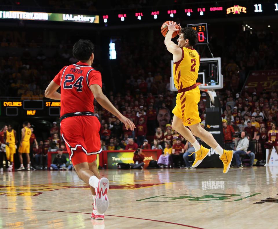 Iowa State guard Caleb Grill grabs one of his 10 rebounds during Sunday's win against St. John's at Hilton Coliseum