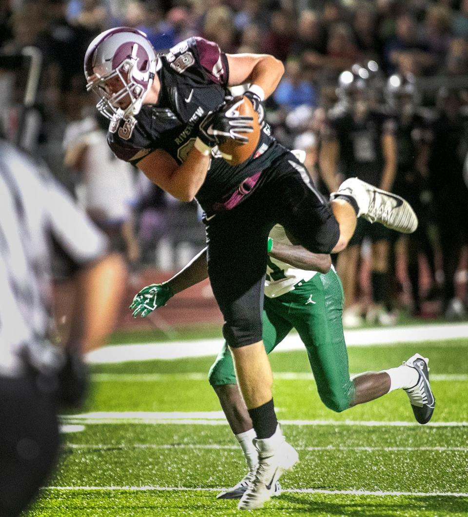 Riverview tight end Luke Petitta (83) grabs a pass in the endzone for a touchdown during their matchup against Venice on neutral ground at Sarasota HIgh School. MATT HOUSTON/HERALD-TRIBUNE