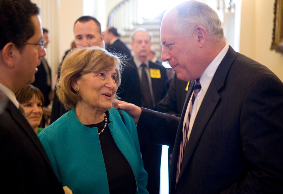Holocaust survivor, Fritzie Fritzshall, of Skokie, and the President of the Illinois Holocaust Museum and Education Center, speaks with Illinois Gov. Pat Quinn following the 29th Annual Illinois Holocaust Commemoration at the Old State Capitol in Springfield, Ill., Thursday, April 15, 2010.