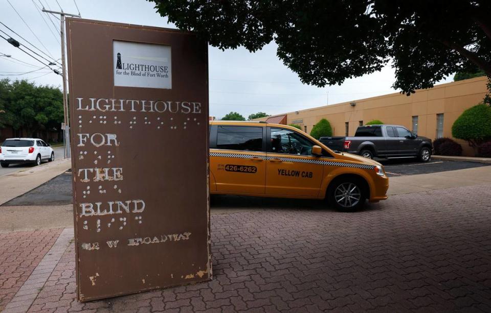 A Trinity Metro’s ACCESS paratransit van waits for riders outside of Lighthouse for the Blind on Wednesday, May 22, 2024. ACCESS is a transportation service for people with disabilities that prevent them from using standard transit options.