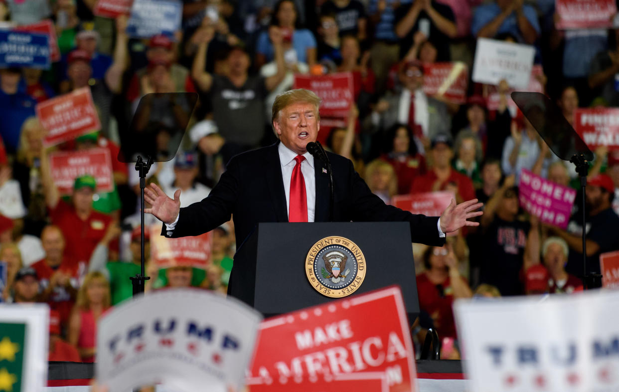 President Trump speaks to supporters at a rally. (Photo: Getty Images)