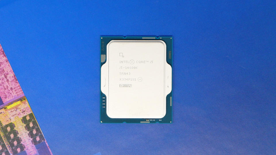 Intel Core i5 14600K on a blue box with Intel logo on it.