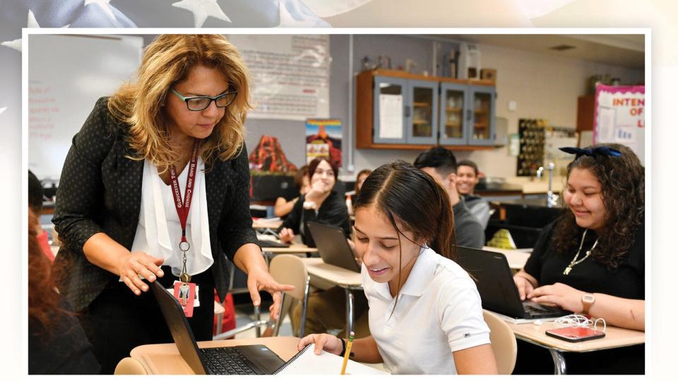 Luzmila Badillo-Gualdron works with Yarelis Ledesma, a bilingual student at Vineland High School on Sept. 30, 2019, in New Jersey.