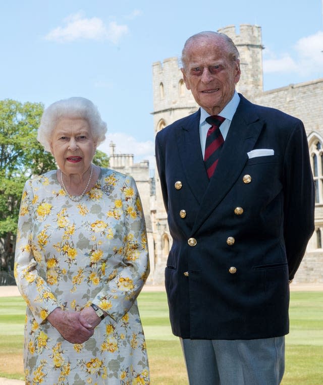 The Queen and the Duke of Edinburgh in the quadrangle of Windsor Castle 