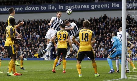 Britain Football Soccer - West Bromwich Albion v Arsenal - Premier League - The Hawthorns - 18/3/17 West Bromwich Albion's Craig Dawson scores their third goal Reuters / Darren Staples Livepic