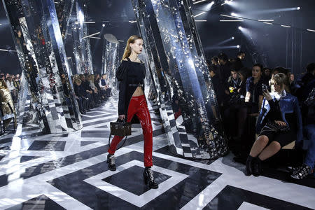 A model wears a creation as part of the Louis Vuitton Ready To