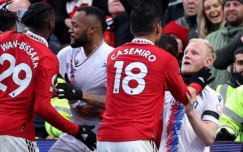 Casemiro grabs Will Hughes around the throat - Alex Livesey/Getty Images