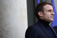 French President Emmanuel Macron waits for the arrival of European Council President Charles Michel prior to their meeting at the Elysee Palace, in Paris, Tuesday, Dec. 10, 2019. The two men discussed Europe's plans for Brexit, European efforts against climate change and this week's European Union summit in Brussels. (AP Photo/Francois Mori)