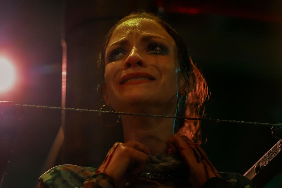 Valentina (Paulette Hernandez) needs to keep her head when sucking bone marrow out of an amputated leg in "Saw X."