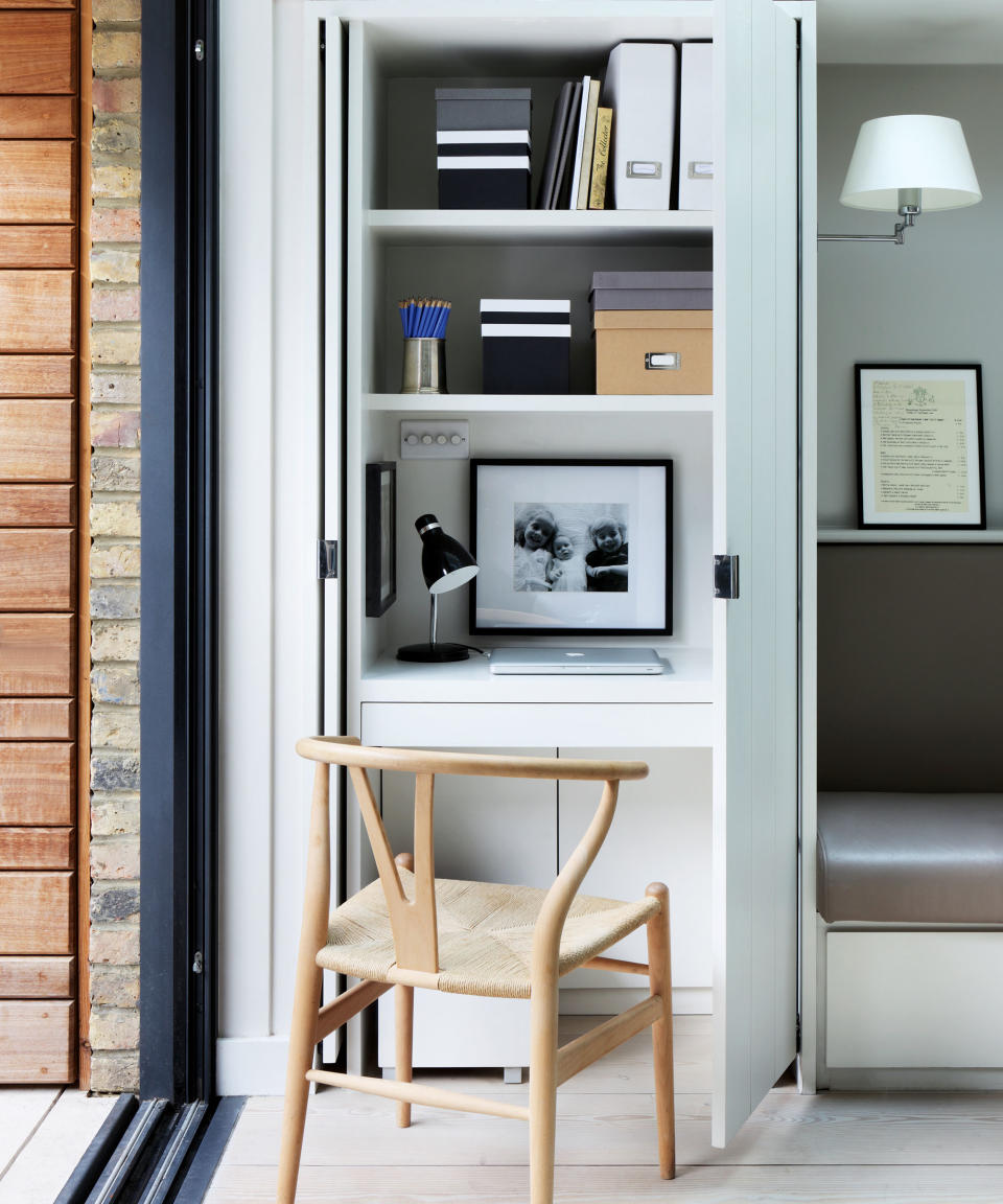 <p> While kitchen tables frequently double up as desks, if the budget allows, try to carve out an area which can be closed off at the end of the day. This neat hidden desk idea was conceived by architectural designers De Rosee Sa and features pivot-sliding pocket doors to hide it out of sight when entertaining or off duty. </p>