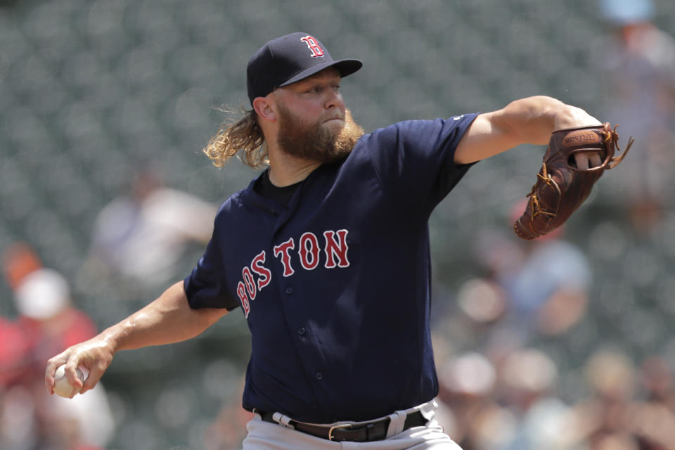 Boston Red Sox starting pitcher Andrew Cashner delivers to a Baltimore Orioles batter during the first inning of a baseball game, Sunday, July 21, 2019, in Baltimore. (AP Photo/Julio Cortez)