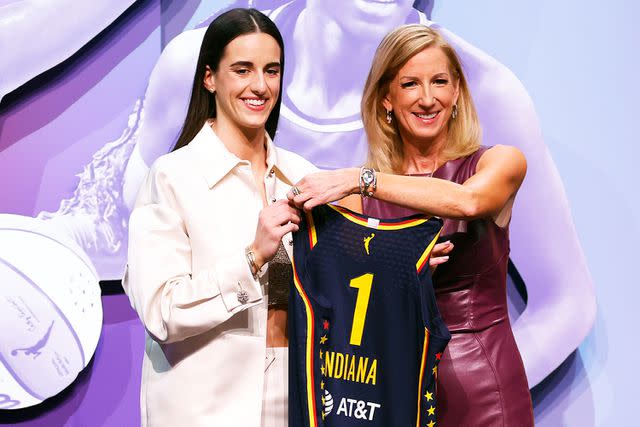 <p>Sarah Stier/Getty</p> Caitlin Clark poses with WNBA Commissioner Cathy Engelbert after being selected first overall pick by the Indiana Fever during the 2024 WNBA Draft at Brooklyn Academy of Music on April 15, 2024 in New York City.