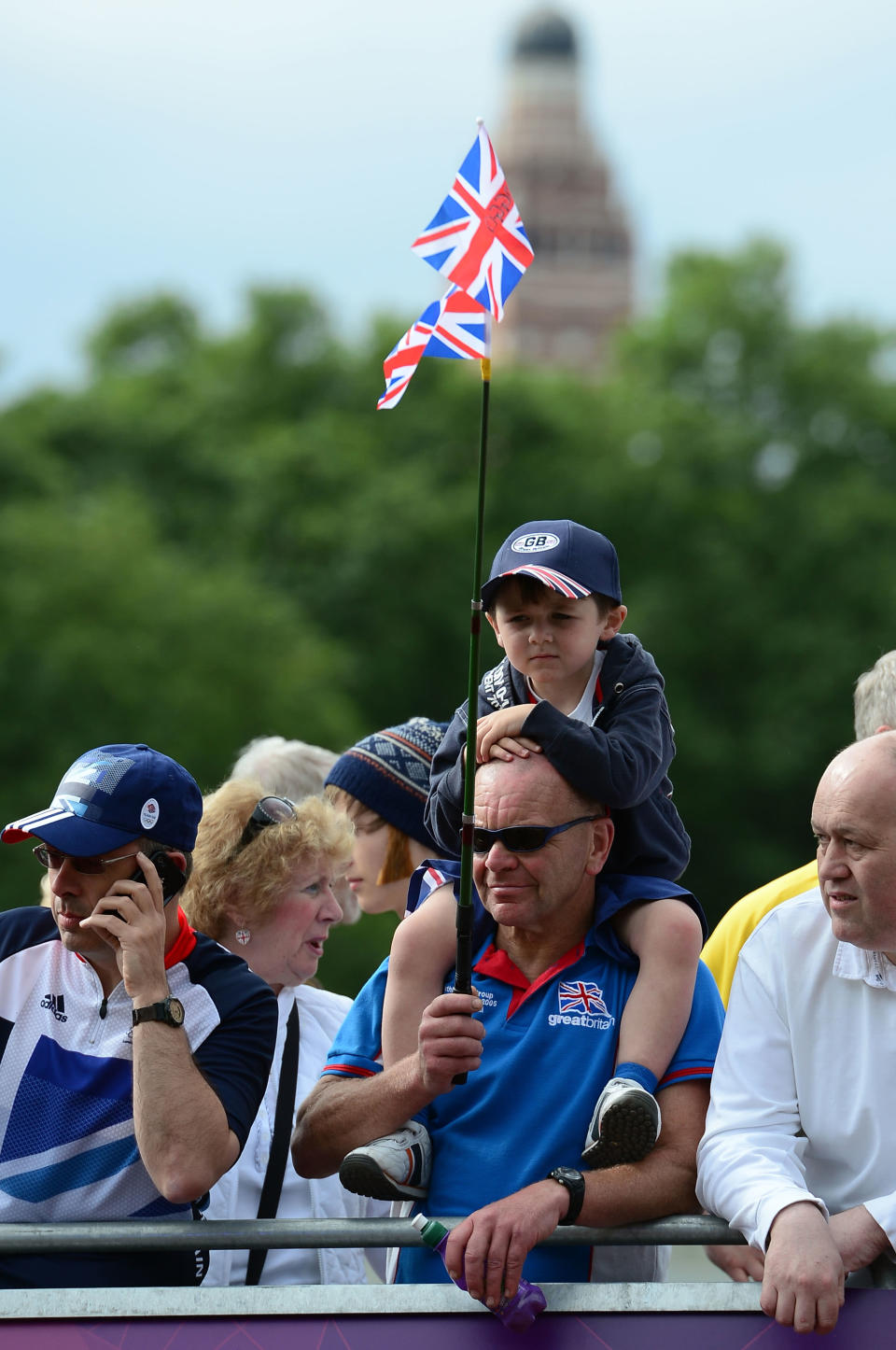 LONDON, ENGLAND - JULY 28: British cycling fans wait for cyclists during the Men's Road Race Road Cycling on day 1 of the London 2012 Olympic Games on July 28, 2012 in London, England. (Photo by Jamie Squire/Getty Images)