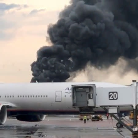 A still image taken from a video obtained by social media, shows smoke billowing after an incident of an Aeroflot Sukhoi Superjet 100 passenger plane at Moscow's Sheremetyevo airport, Russia May 5, 2019. INSTAGRAM/@BIORAVEN911/via REUTERS