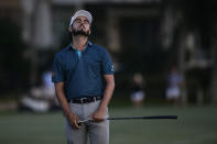Abraham Ancer reacts after missing a birdie to lose to Webb Simpson by one stroke on the 18th green, during the final round of the RBC Heritage golf tournament, Sunday, June 21, 2020, in Hilton Head Island, S.C. (AP Photo/Gerry Broome)