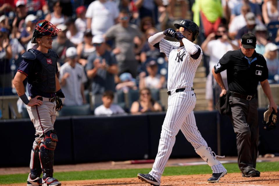 New York Yankees' Juan Soto celebrates after hitting a home run in the fourth inning of a spring training baseball game against the Atlanta Braves Sunday, March 10, 2024, in Tampa, Fla. (AP Photo/Charlie Neibergall)