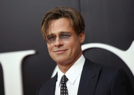 FILE PHOTO -- Cast member Brad Pitt poses on the red carpet at the premiere of "The Big Short" in New York November 23, 2015. REUTERS/Shannon Stapleton/File Photo