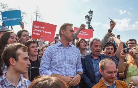 Russian opposition leader Alexei Navalny (C) attends a protest rally ahead of President Vladimir Putin's inauguration ceremony, Moscow, Russia May 5, 2018. REUTERS/Stringer