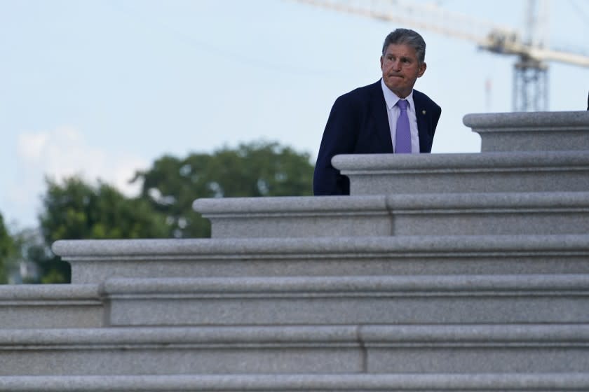 Sen. Joe Manchin, D-W.Va., walks up the steps of Capitol Hill in Washington, Monday, June 7, 2021. (AP Photo/Susan Walsh)