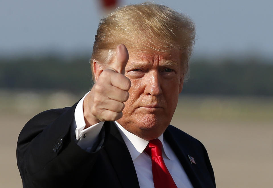 President Trump gives thumbs-up as he arrives at Andrews Air Force base in Maryland on Oct. 8, 2018. (Photo: Alex Brandon/AP)