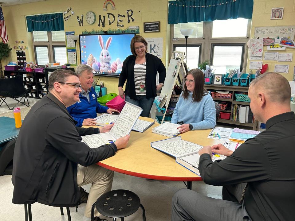 Cambridge City School District Board of Education members try out the Cambridge Intermediate School curriculum and Chromebooks, to experience what their students utilize daily.