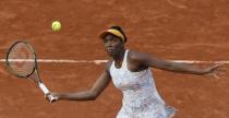 Tennis - French Open - Roland Garros -Venus Williams of the U.S. vs Louisa Chirico of the U.S. - Paris, France - 26/05/16. Williams returns the ball. REUTERS/Gonzalo Fuentes