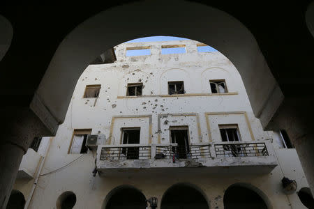 FILE PHOTO: A historic building, that was damaged during a three-year conflict, is seen in Benghazi, Libya February 28, 2018. REUTERS/Esam Omran Al-Fetori/File Photo